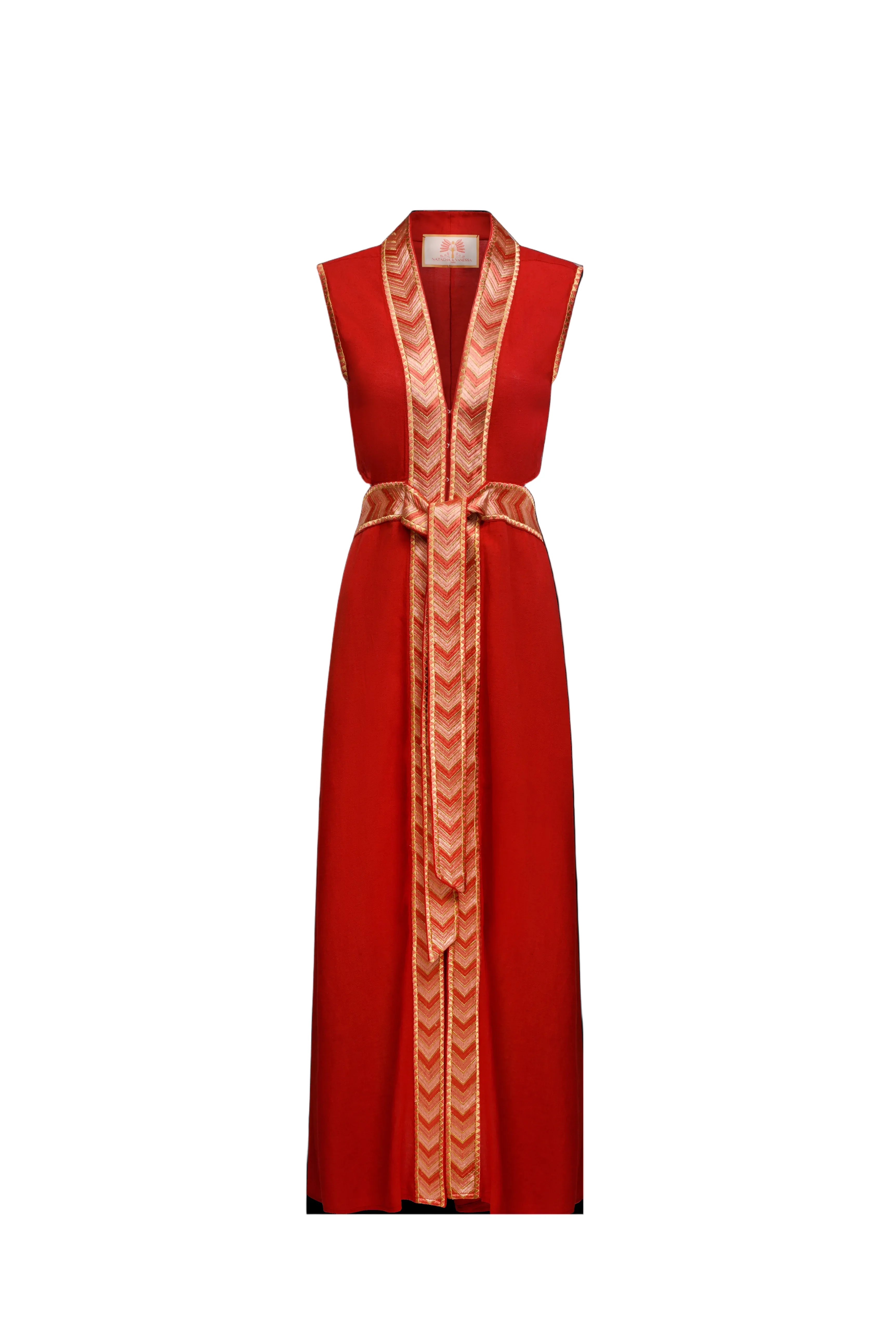 Natacha & Vanessa The Thalie dress in red with a deep V-neck, woven embroidered trim, and detachable braided belt.