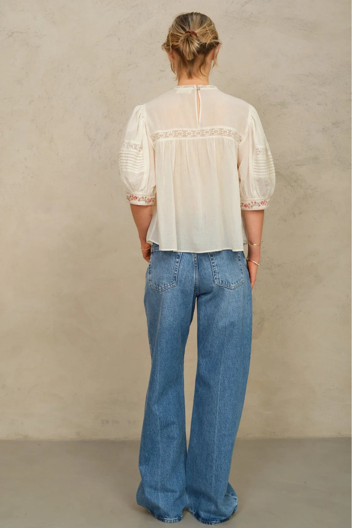 Back view of M.A.B.E Fleur embroidered cotton top