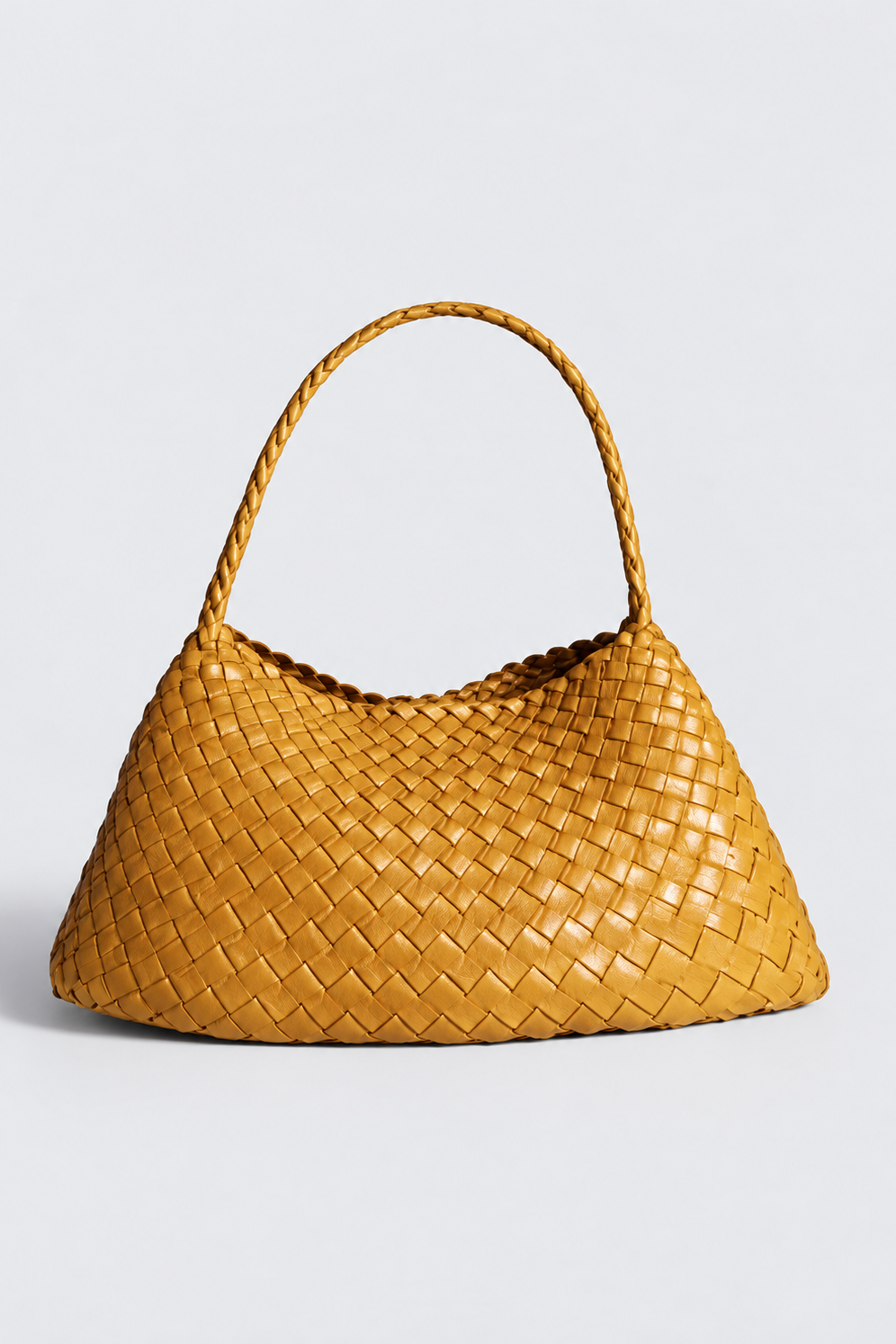 Front view of the Rosalia Medium woven leather shoulder bag with a braided strap.