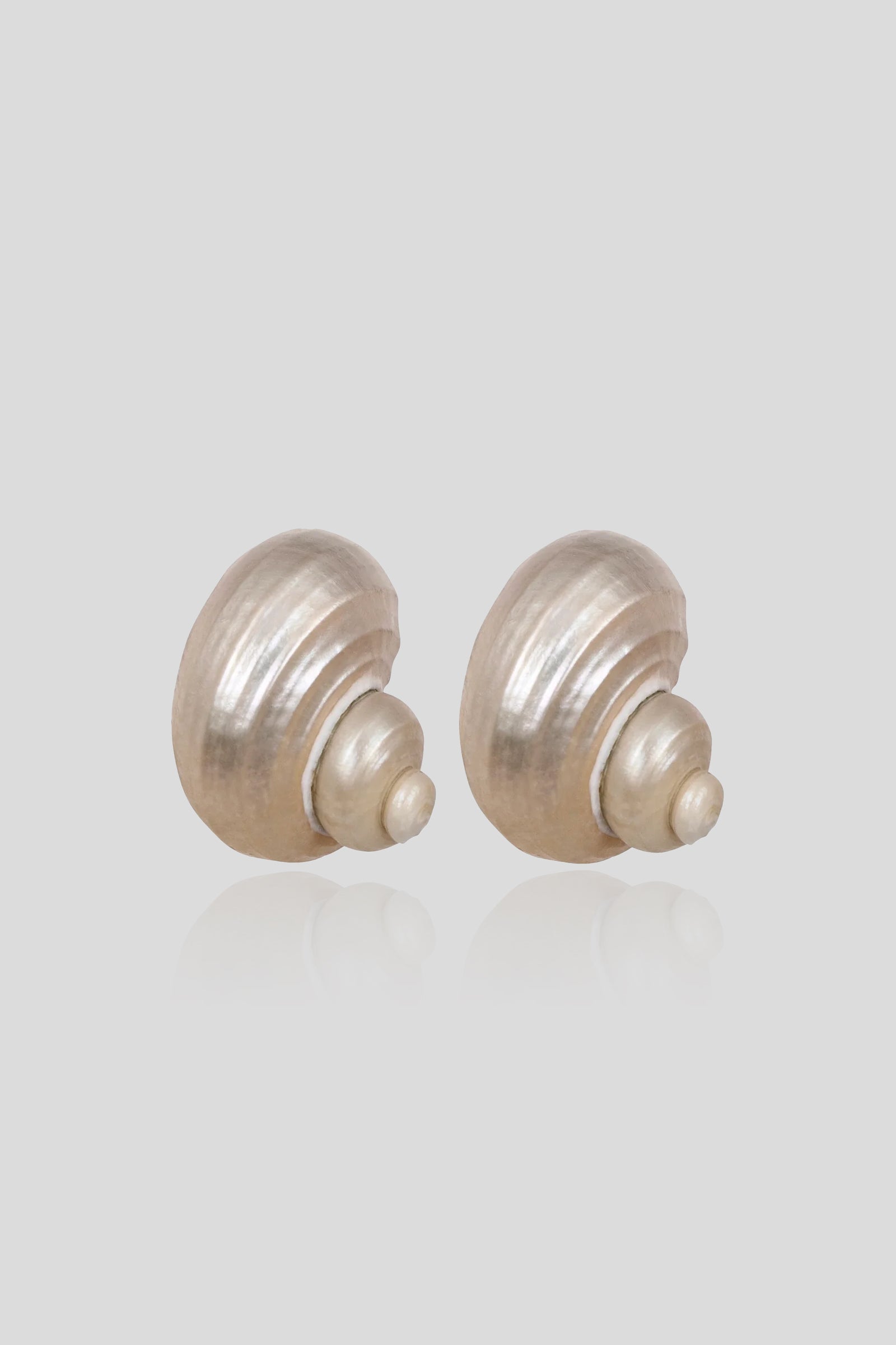 Jennifer Behr Luca Earrings handcrafted from natural ivory turbo mollusc shells with a luminous pearlescent finish.