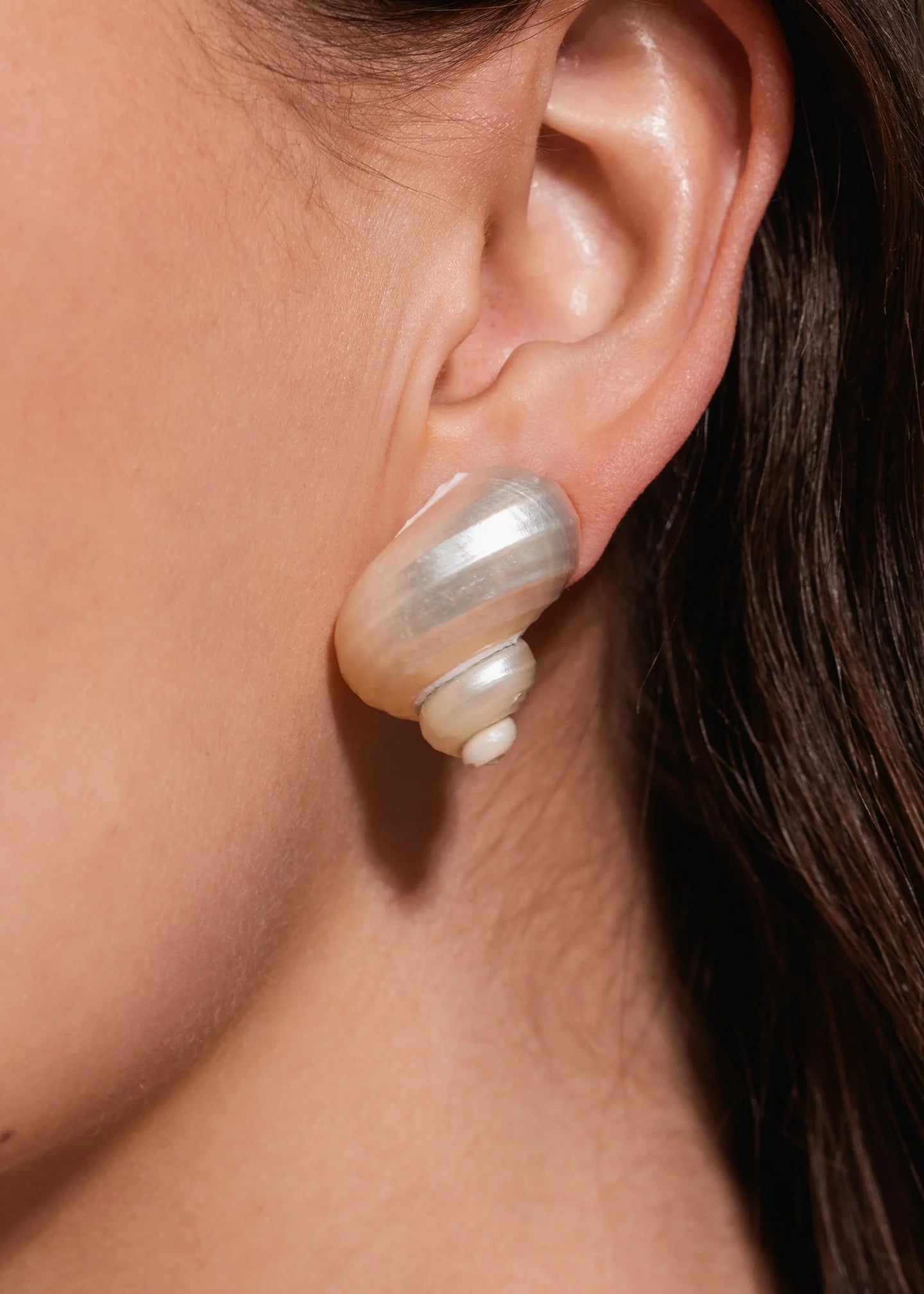 Close-up of Jennifer Behr Luca Earrings showcasing the natural ivory shell texture and pearlescent finish.