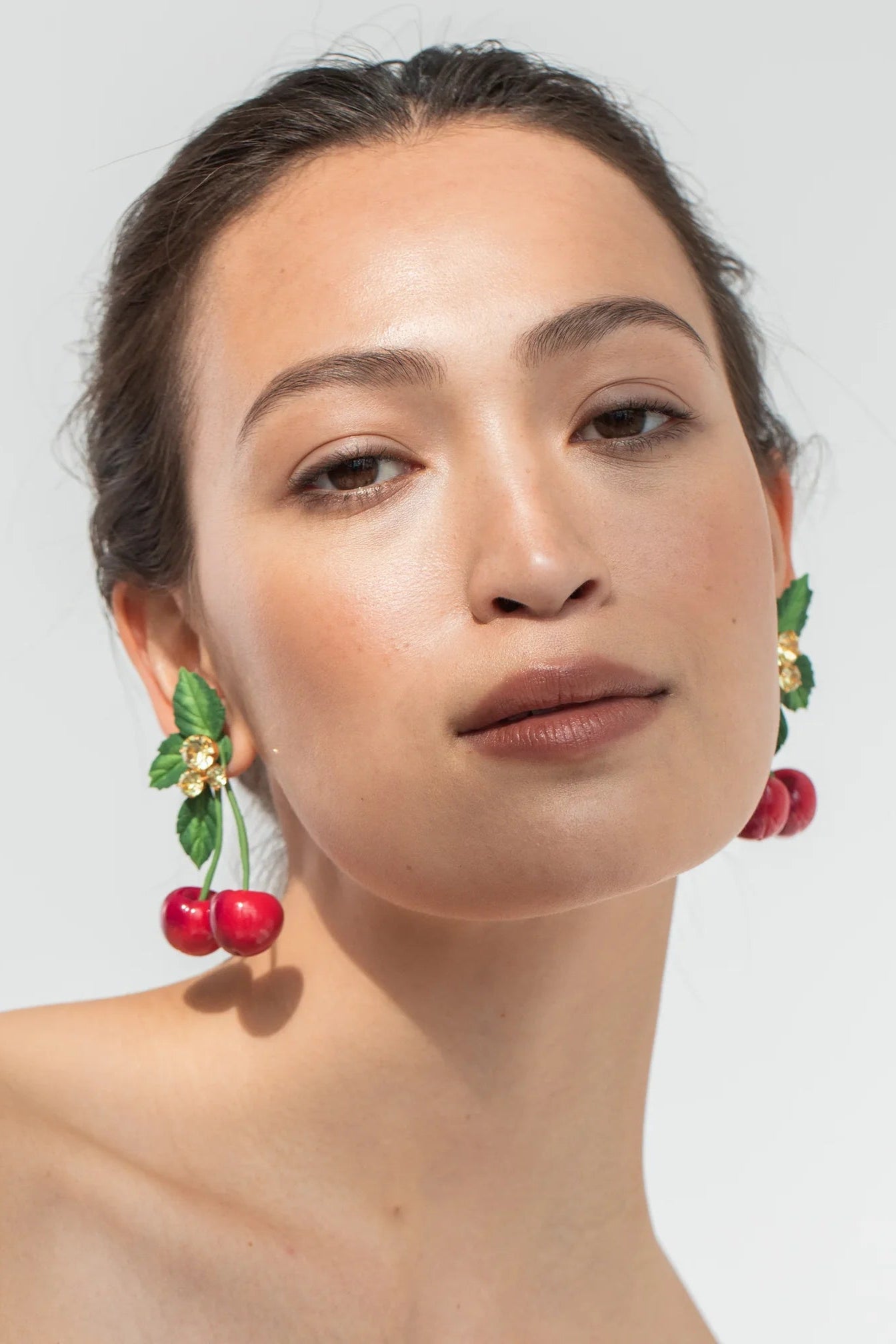 Front view of Jennifer Behr Maraschino Earrings featuring cherry drops, textured leaves, and crystal accents.