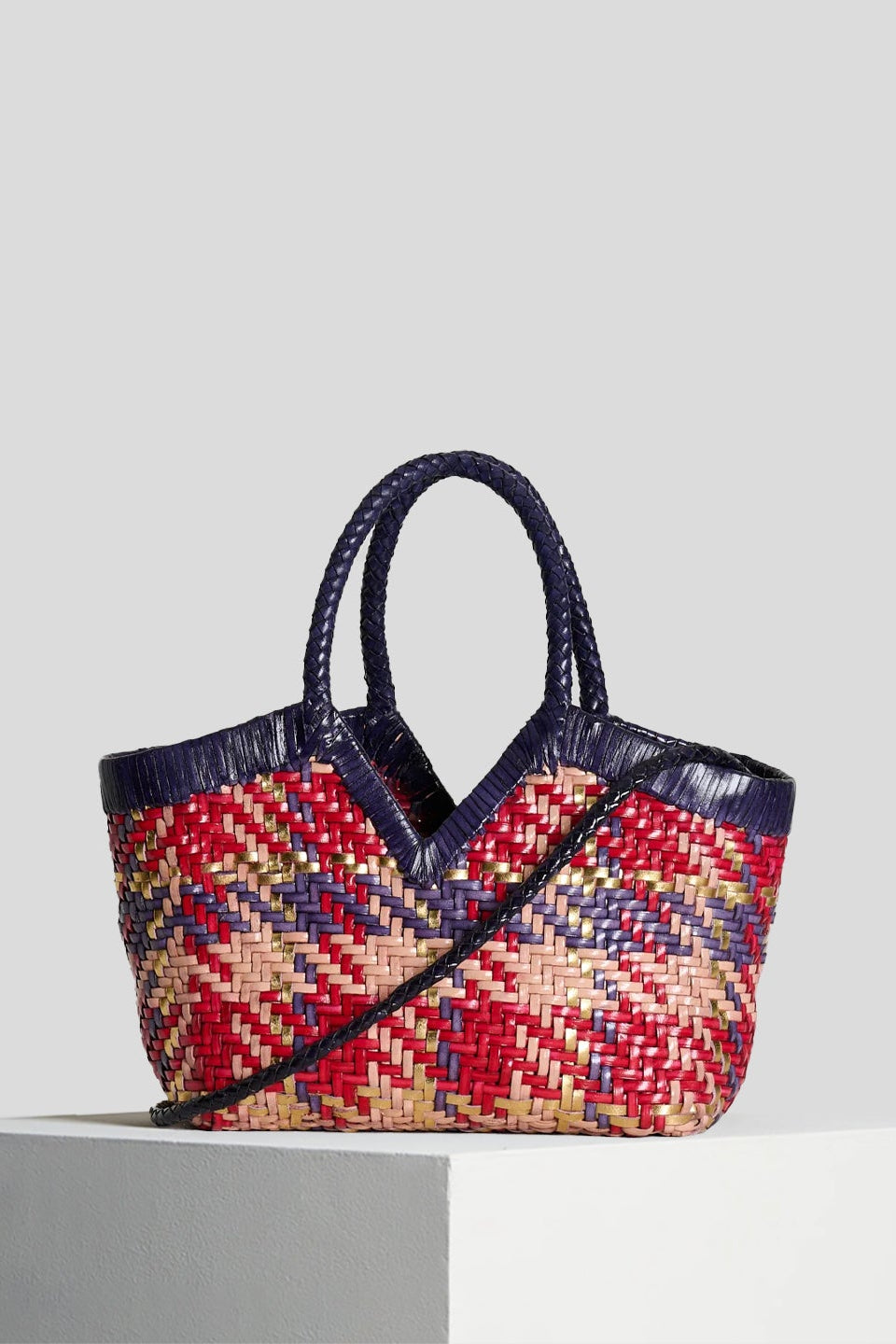 Vipera Monet Madras handwoven leather tote with braided top handles and removable shoulder strap, front view.