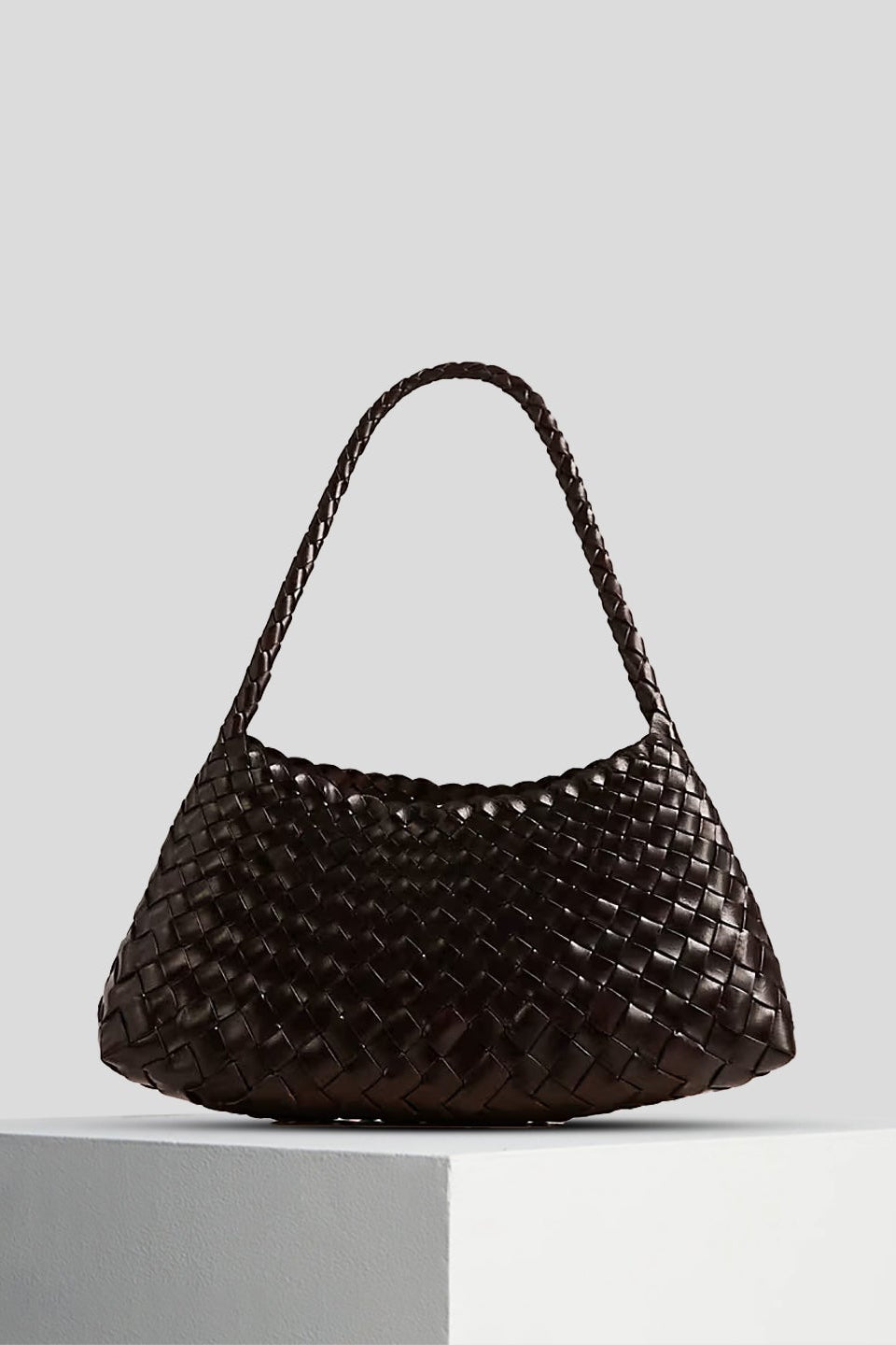 Dragon Diffusion Rosalia Shoulder Bag in dark brown displayed on a white pedestal.