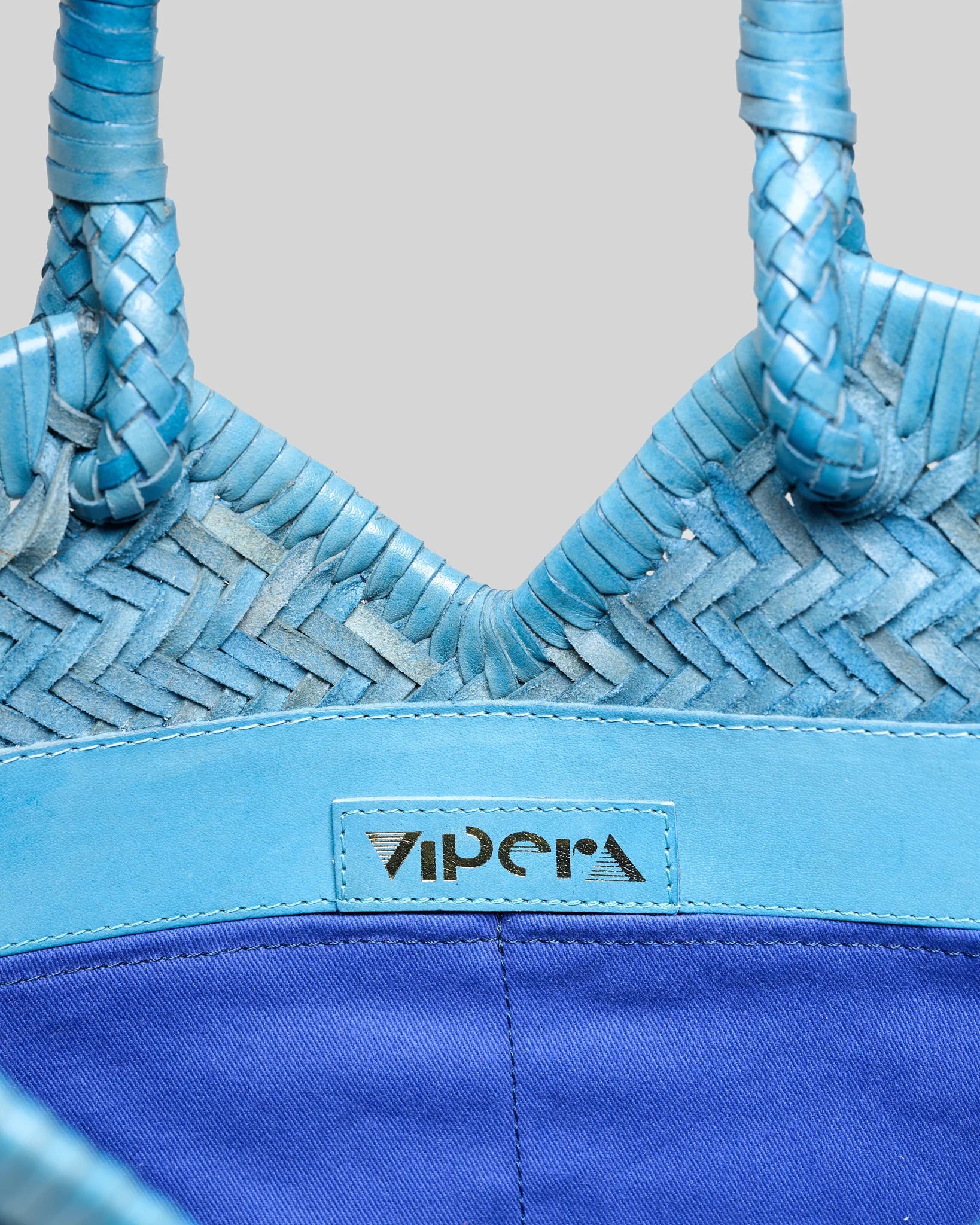 Vipera The Label Light Blue Crudelia handwoven leather tote bag interior detail with Vipera logo