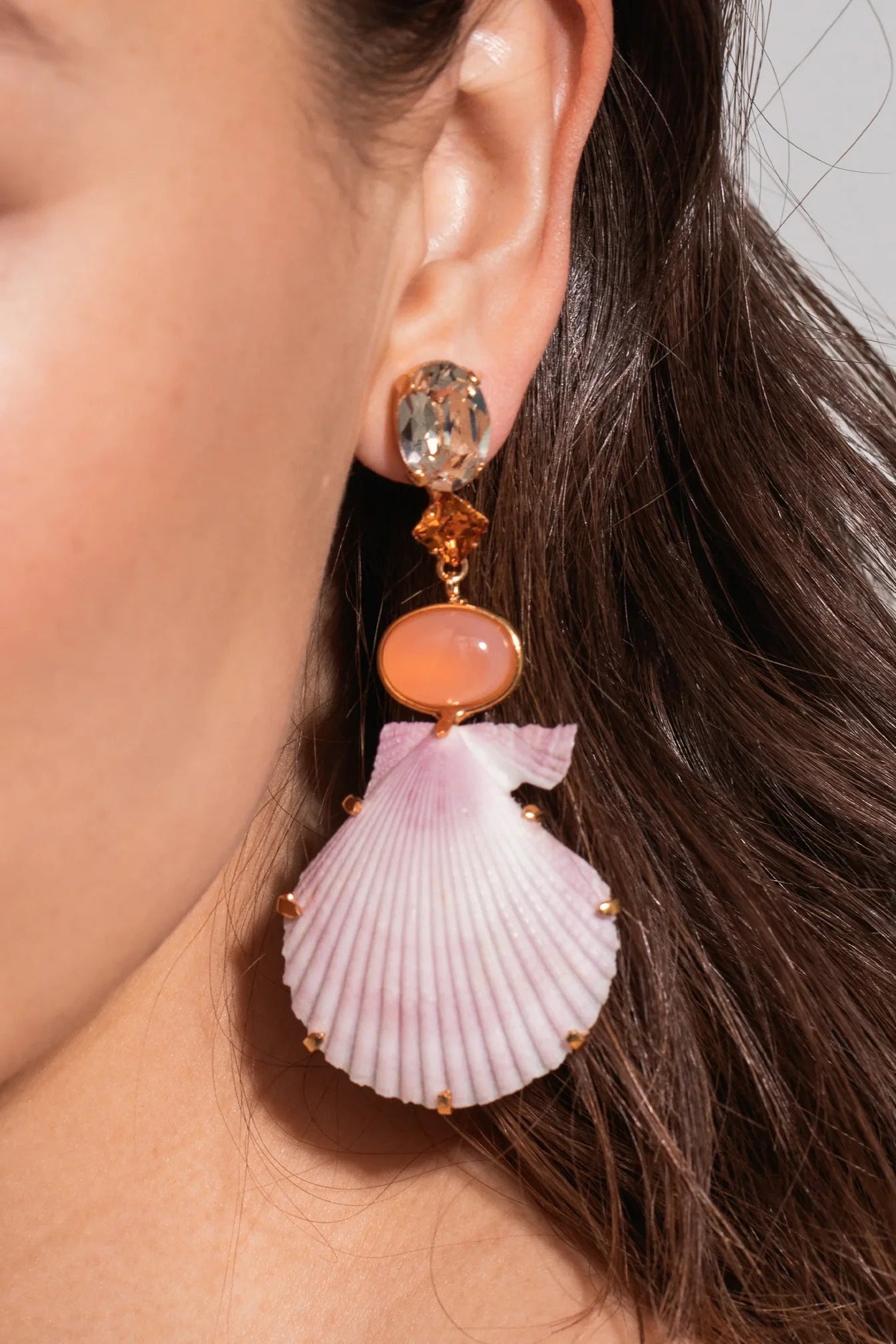 Detailed view of Jennifer Behr Adrielle Earrings highlighting the pink chalcedony cabochon and natural shell texture.
