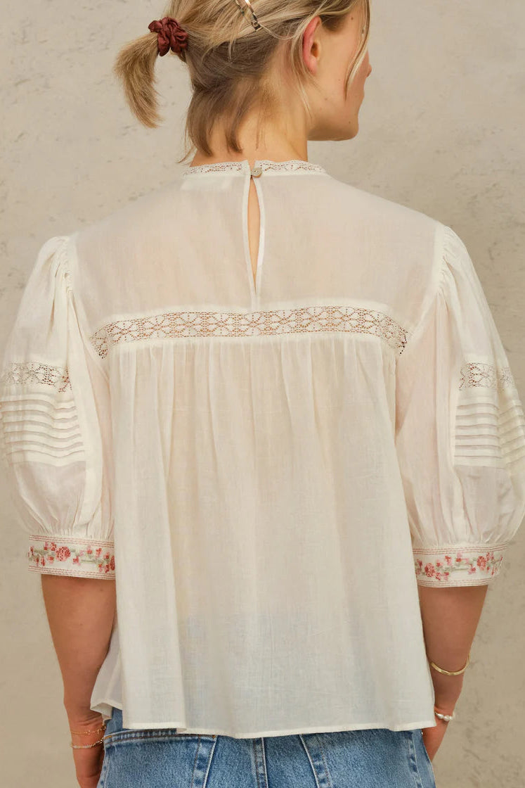 Back view of M.A.B.E Fleur embroidered cotton top