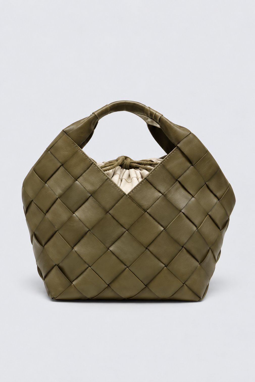 Front view of the Botteghe Khaki bucket bag with wide diagonal leather strips and integrated handles.