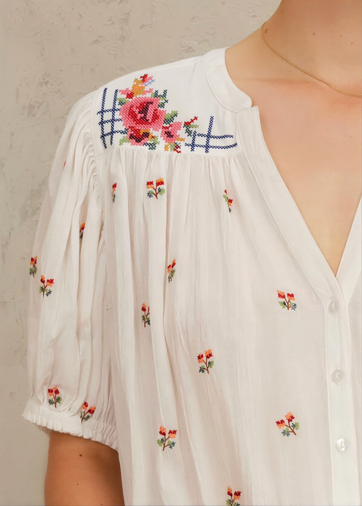 Close-up embroidery detail on M.A.B.E Harlie top