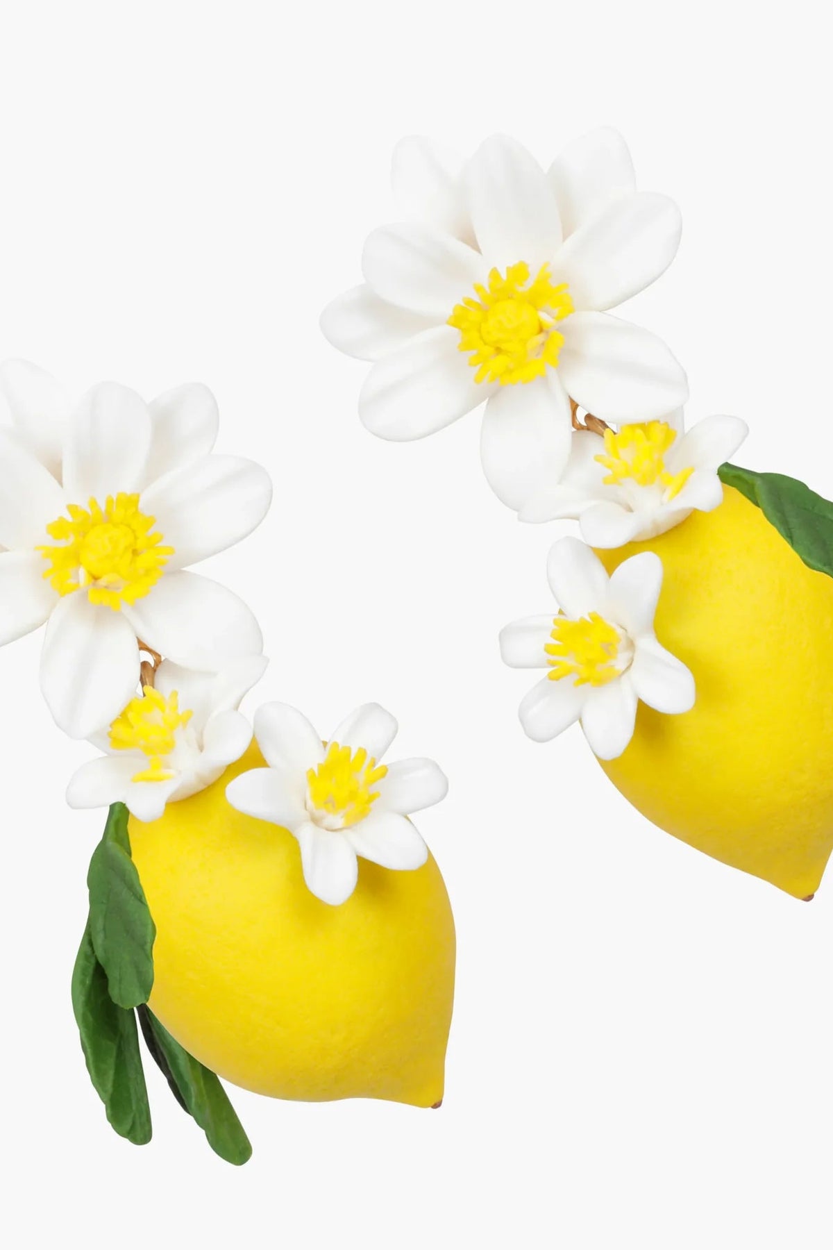 Close-up of Jennifer Behr Limoncello Earrings showcasing the hand-sculpted lemon and floral details.