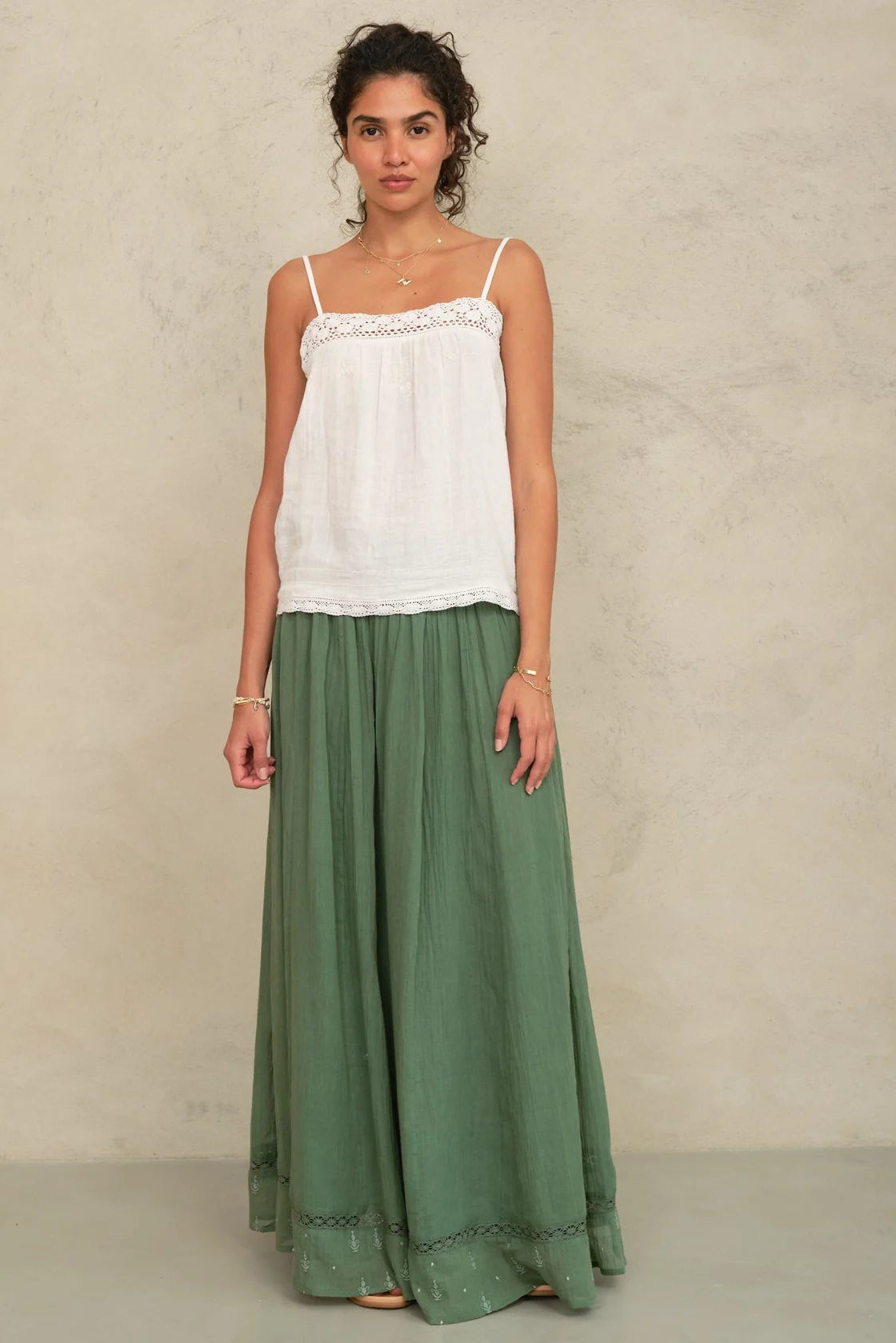 M.A.B.E. sage green maxi skirt styled with white camisole top