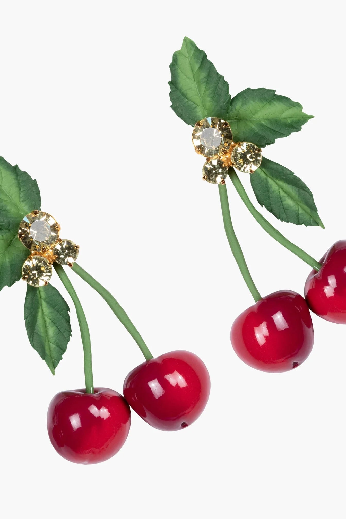 Close-up of Jennifer Behr Maraschino Earrings showcasing the handcrafted cherry design and Austrian crystal detailing.