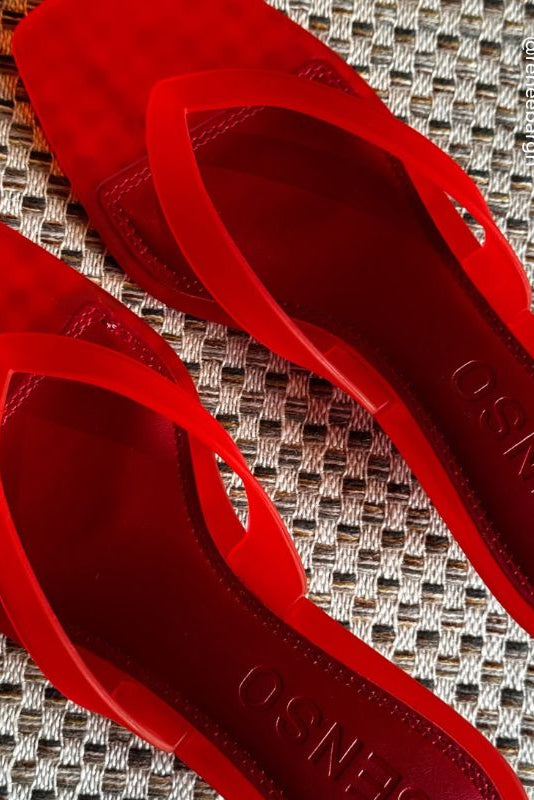 Senso Sonya cherry flip flops with branded footbed and translucent thong straps close-up view