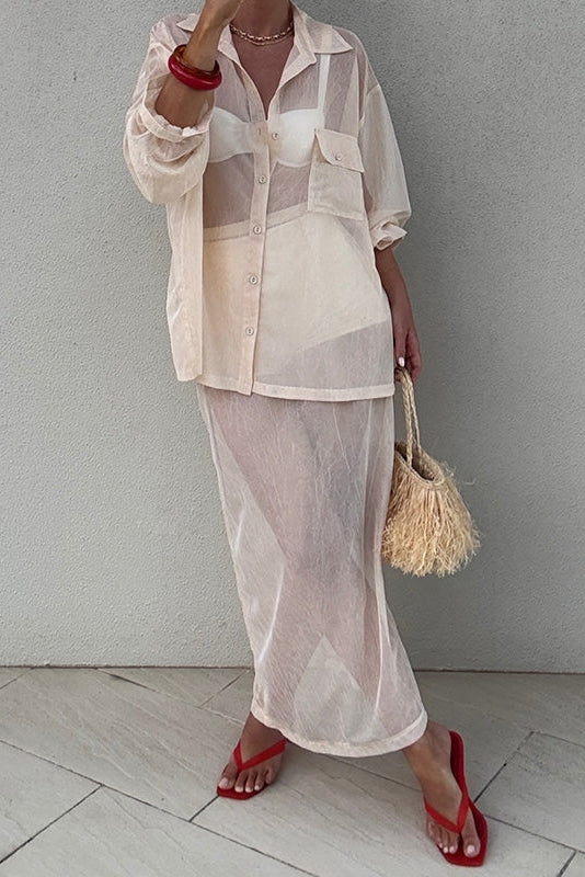 Senso Sonya cherry flip flops styled with a sheer cream maxi skirt and oversized shirt