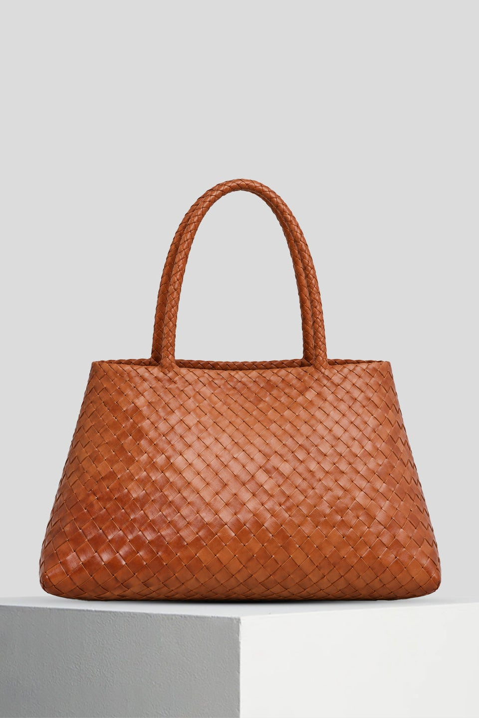 Santa Lucia XXL woven leather shoulder bag in Safari, shown at an angled front view on a white background.