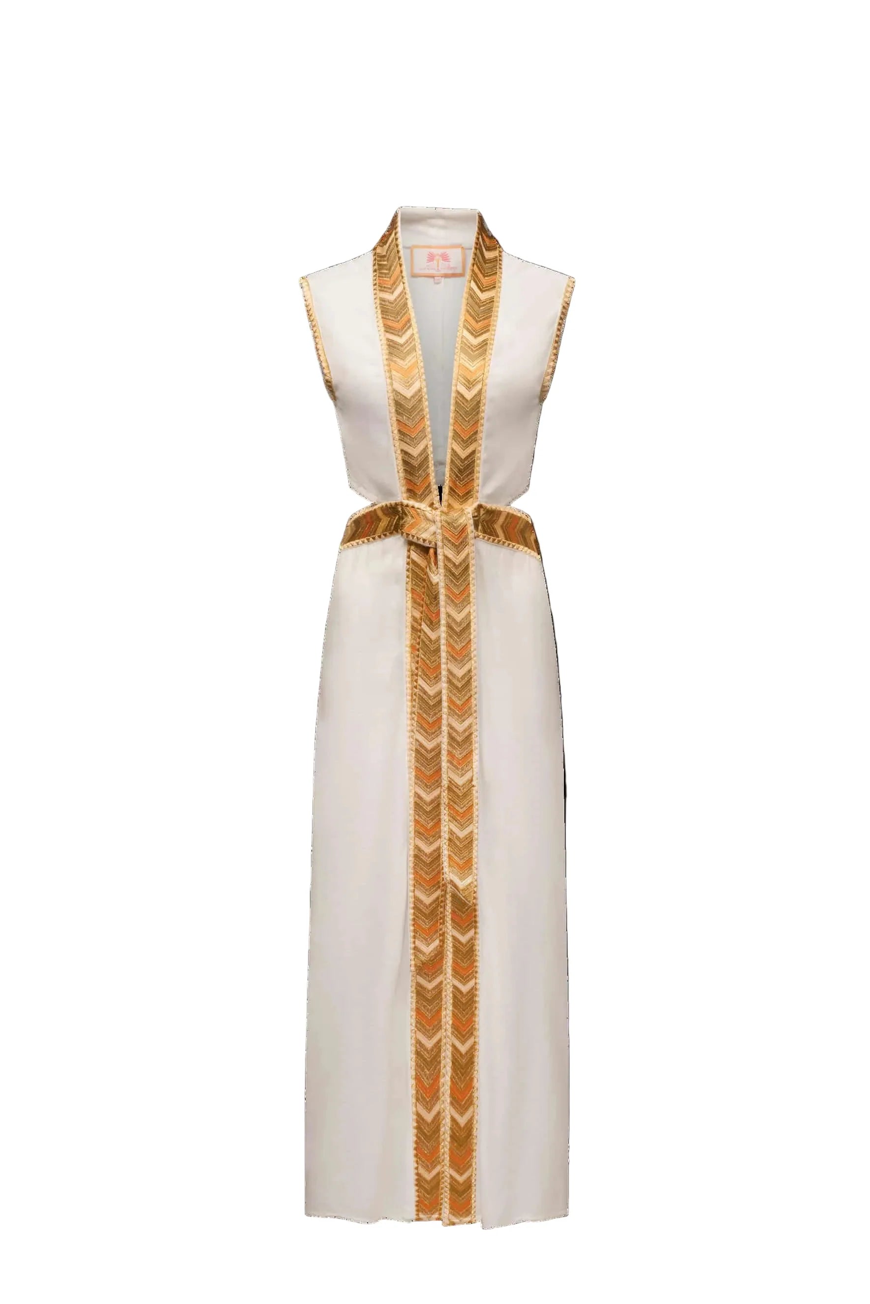 Natacha & Vanessa The Thalie Dress in White with a deep V-neck, woven gold trim, and detachable braided belt.