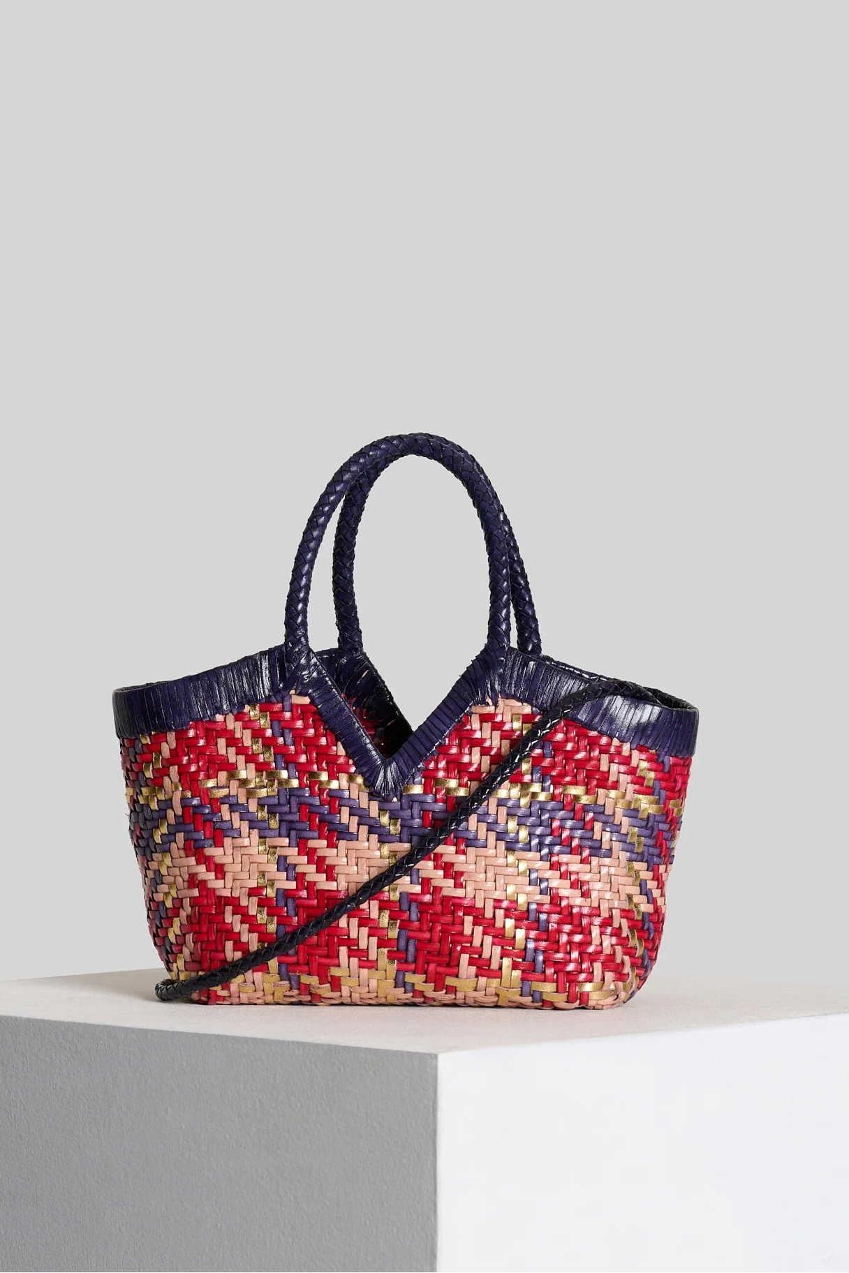 Vipera Monet Madras handwoven leather tote with braided top handles and removable shoulder strap, front view.